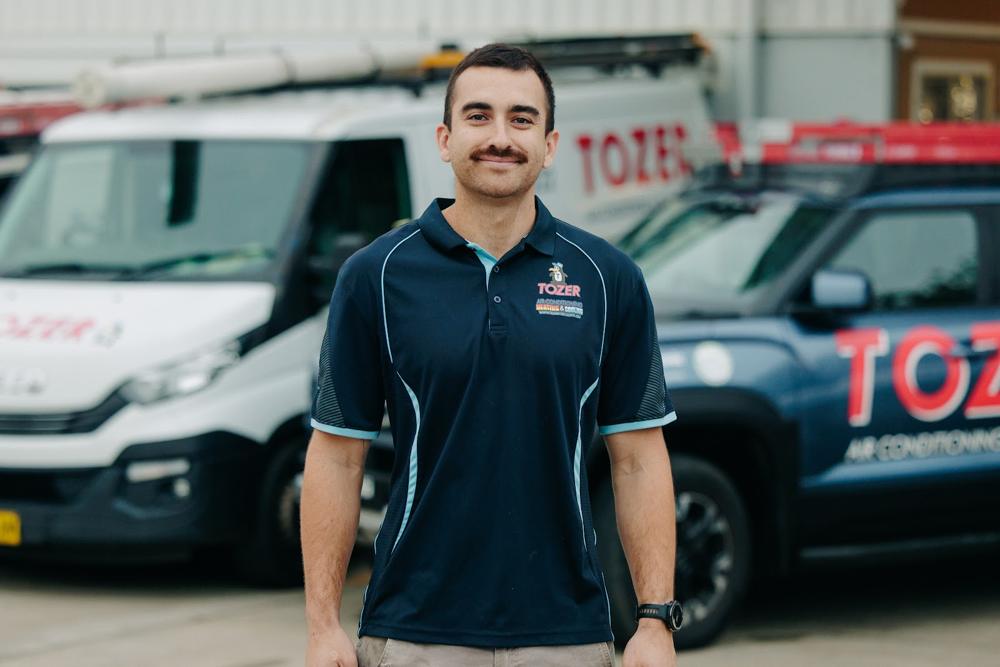 Installation technician in TOZER uniform