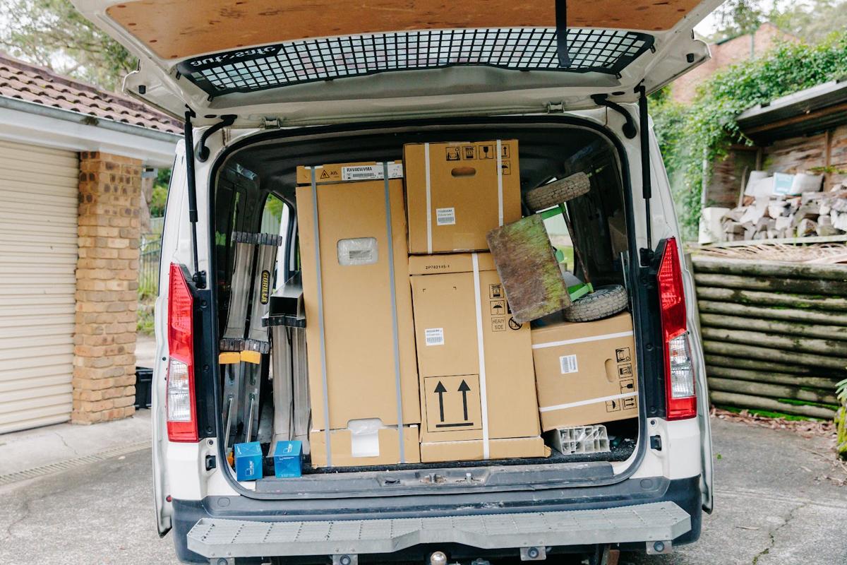 Van loaded with boxed units for the day's installs